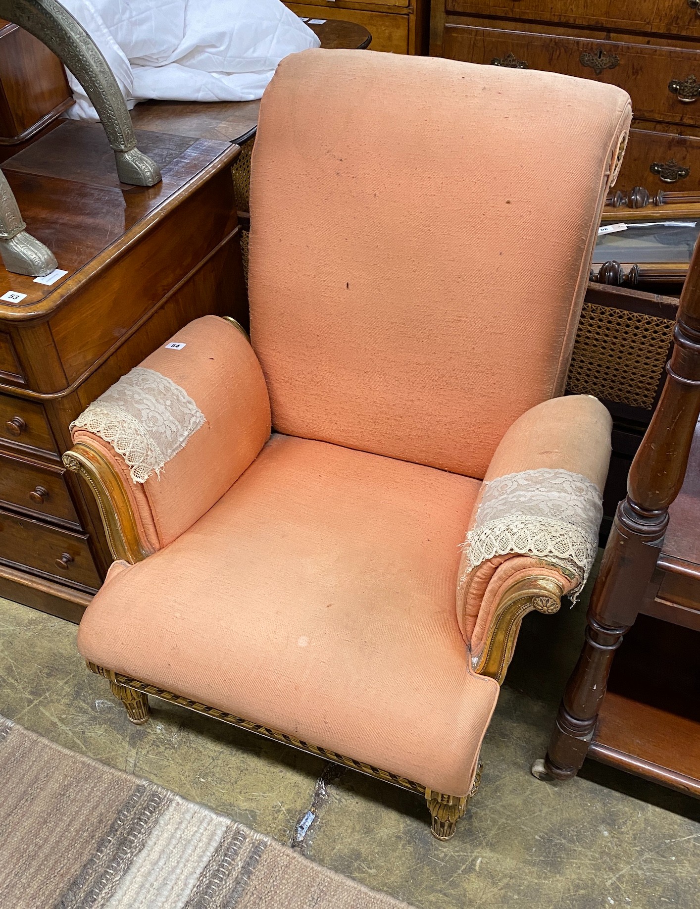 A Victorian carved giltwood upholstered armchair, width 78cm, depth 84cm, height 93cm